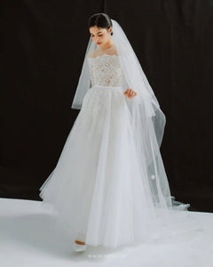 Elegant off-the-shoulder wedding dress with flared skirt and long sleeves - D1746 - POXI